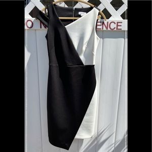 Calvin Klein size 2 black and white color block asymmetrical dress.